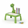 Mesa de dibujo con proyector de dinosaurio WISHFUL en color verde, incluye rotuladores y discos de diapositivas.