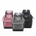Mochilas WISHFUL tipo boca de pez en colores rosa, gris y negro con compartimento frontal y asas superiores