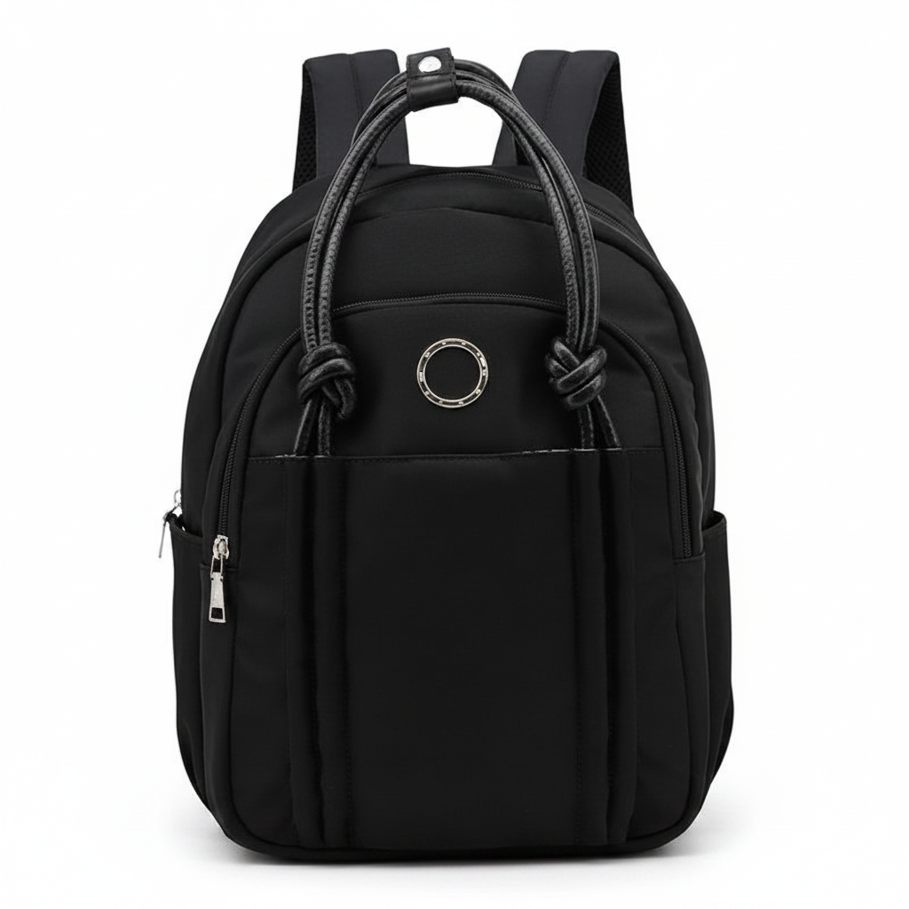 Mochila negra WISHFUL con asas de cordón trenzado, compartimento frontal y diseño moderno y funcional.